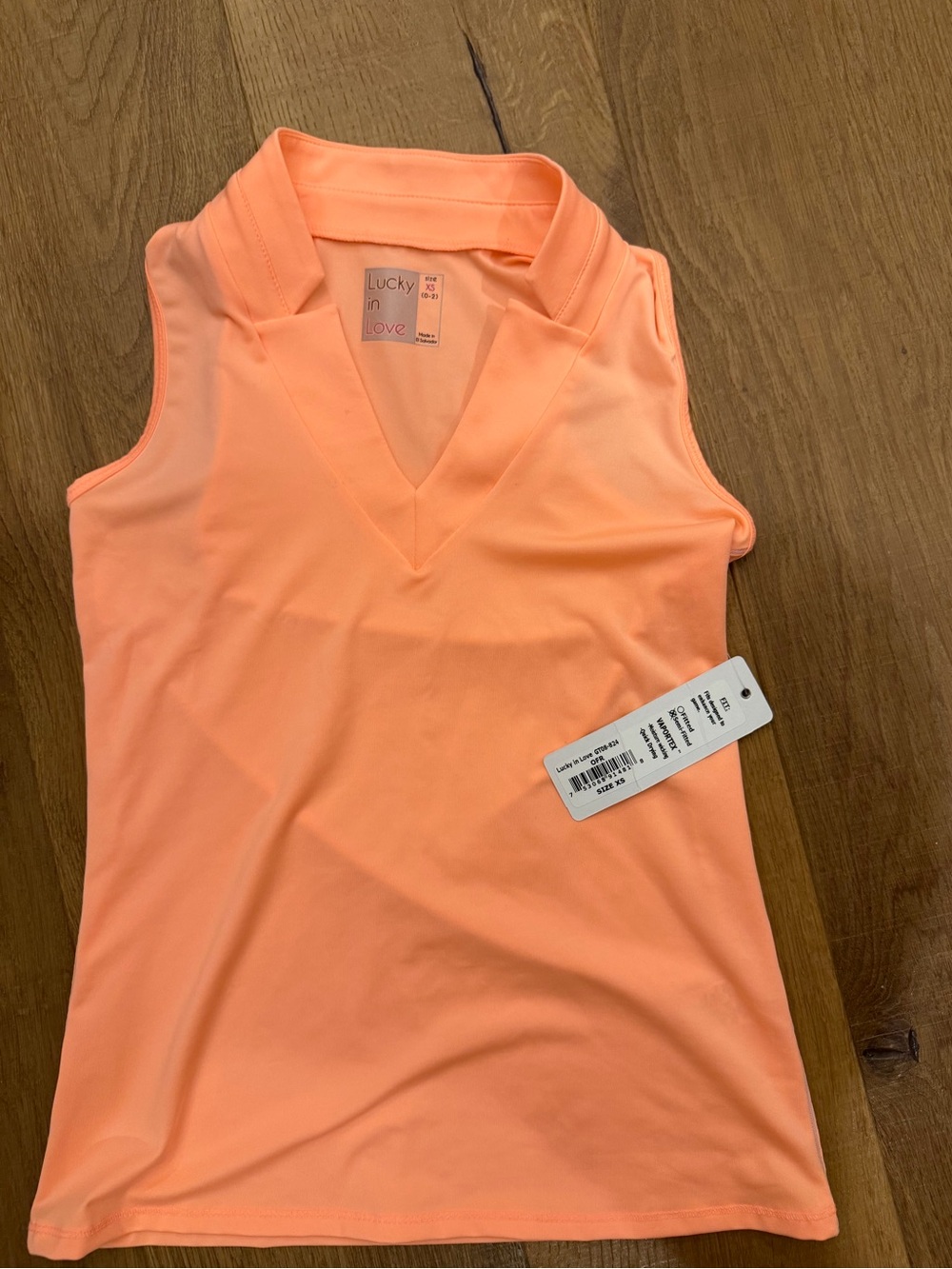Lucky In Love Women's Sleeveless V-Neck Top in Coral “eyelet you go” line